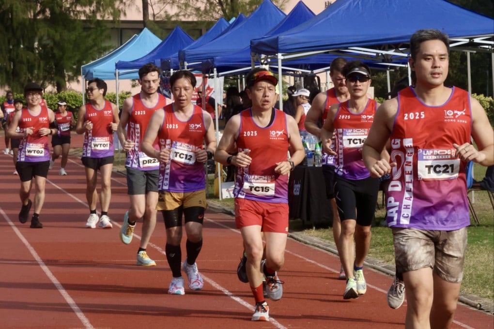 Lap Dog Challenge runners help to raise funds for the victims of the Tai Po fire. Photo: Jonathan Wong