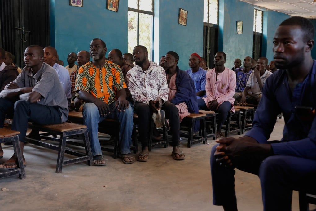 Worried parents of abducted schoolchildren at St Mary’s Catholic school last month. Photo: AP