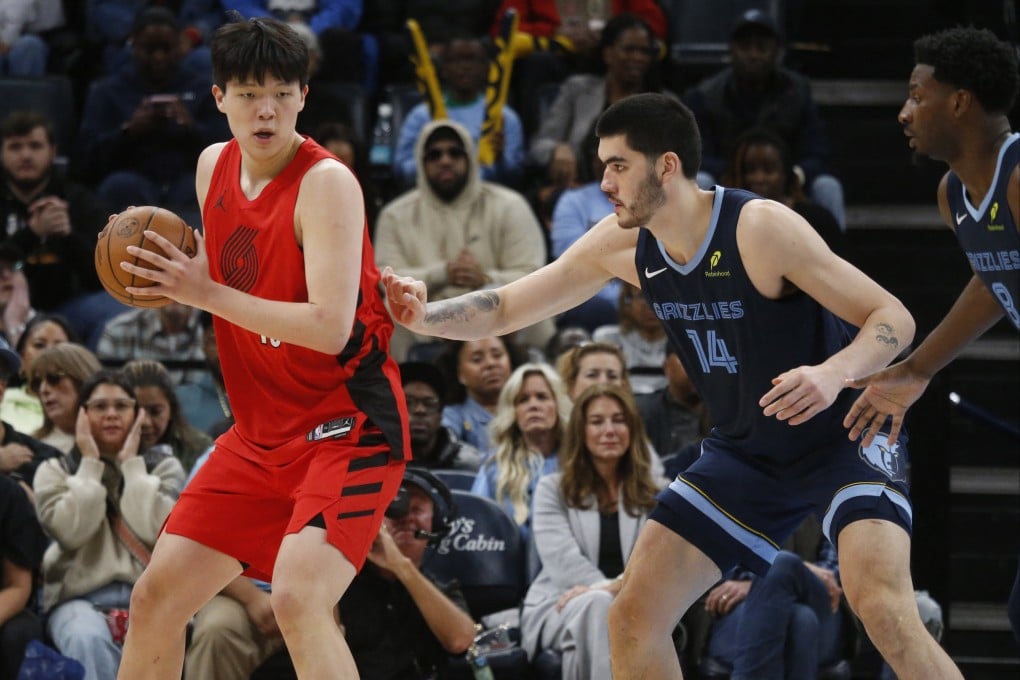 Yang Hansen (left) in action for Portland Trail Blazers in Memphis. Photo: Imagn Images via Reuters Connect