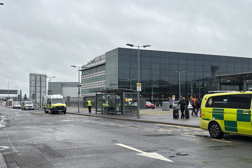 Emergency vehicles outside Heathrow Airport Terminal 3. A man was arrested on Sunday on suspicion of assault after a number of people were attacked with “a form of pepper spray” by a group of men. Photo: PA Wire / dpa