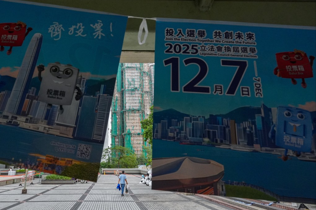 Banners for the 2025 Legislative Council General Election are seen at Kwong Fuk Estate, next to the scene of the deadly fire at Wang Fuk Court in Tai Po, on December 7. Photo: Eugene Lee