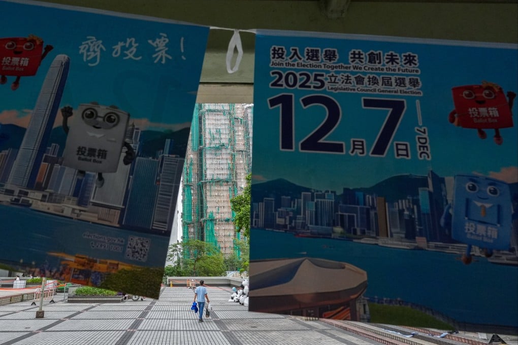 Banners for the 2025 Legislative Council General Election are seen at Kwong Fuk Estate, next to the scene of the deadly fire at Wang Fuk Court in Tai Po, on December 7. Photo: Eugene Lee