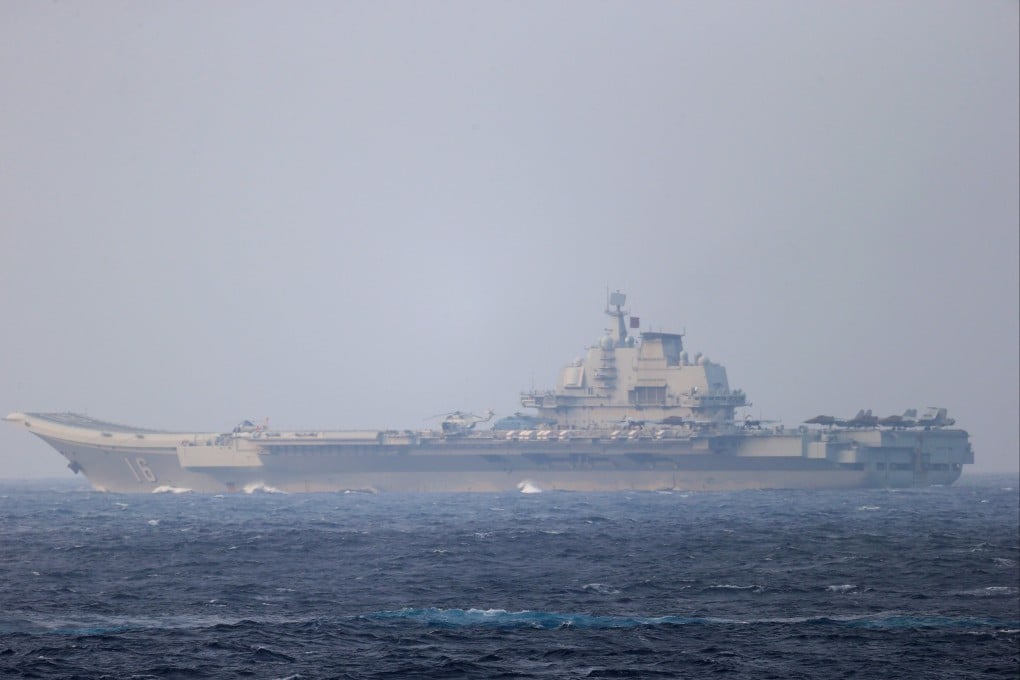 Japan’s Self-Defence Forces says China’s Liaoning carrier, pictured in 2021, and three guided missile destroyers are continuing drills in waters near Japan. Photo: Handout via Reuters