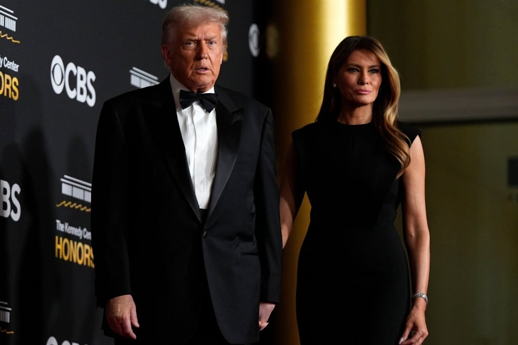 US President Donald Trump and first lady Melania Trump walk the red carpet. Photo: AP