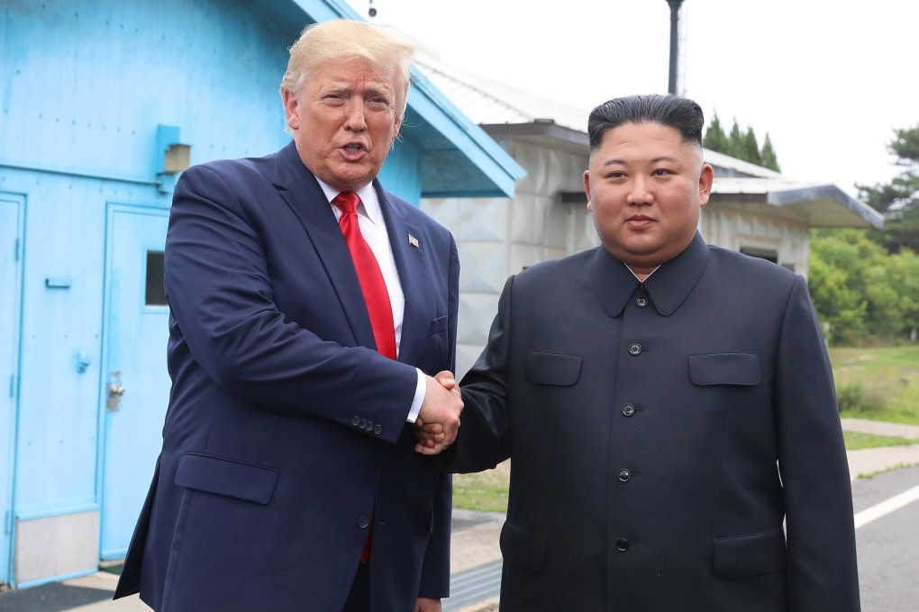 North Korean leader Kim Jong-un (right) and US President Donald Trump inside the demilitarized zone separating South and North Korea in June 2019. Photo: TNS