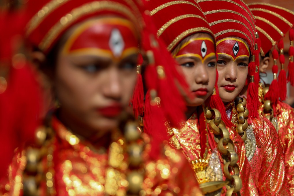 Nepali girls dressed in traditional attire take part in a harvest festival celebration in Kathmandu on Thursday. Photo: Xinhua