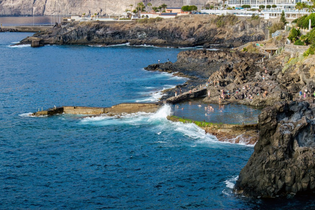 People swimming at Isla Cangrejo on Tenerife’s Los Gigantes coast. File photo: Shutterstock