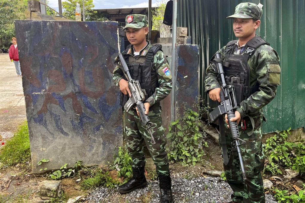 Soldiers of the Myanmar junta-linked Democratic Karen Benevolent Army guard a checkpoint in Payathonzu, Kayin state, on October 4. Photo: Kyodo