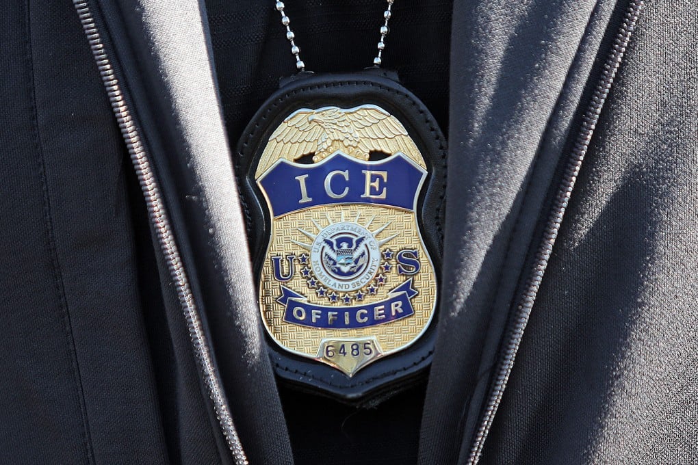 An Immigration and Customs Enforcement (ICE) officer’s badge seen during a sweep. Photo: Boston Herald/TNS