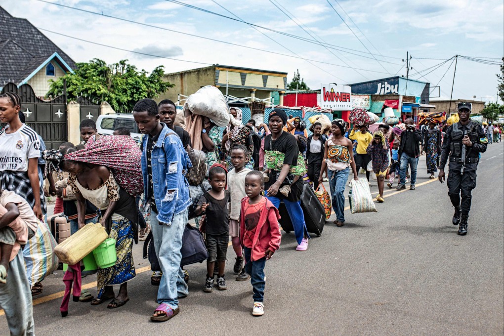 Displaced people from the Democratic Republic of Congo arrive in Bugarama, a town in western Rwanda on December 5, after fleeing intense shelling in the bordering Kamanyola region. Photo: AFP