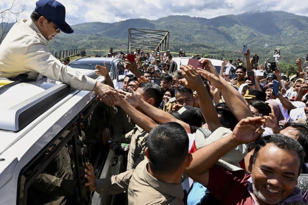 Indonesian President Prabowo Subianto greets flood survivors during his visit to Southeast Aceh on December 1. Photo: Indonesian Presidential Palace/AP