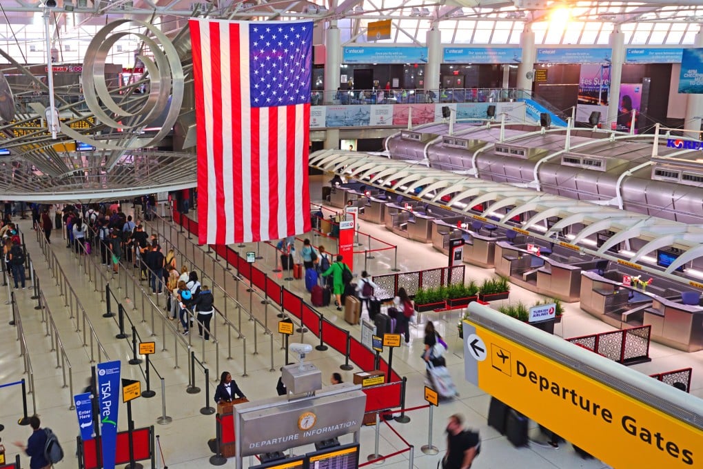 View of a giant American flag inside Terminal 1 at JFK airport in New York. Photo: Shutterstock