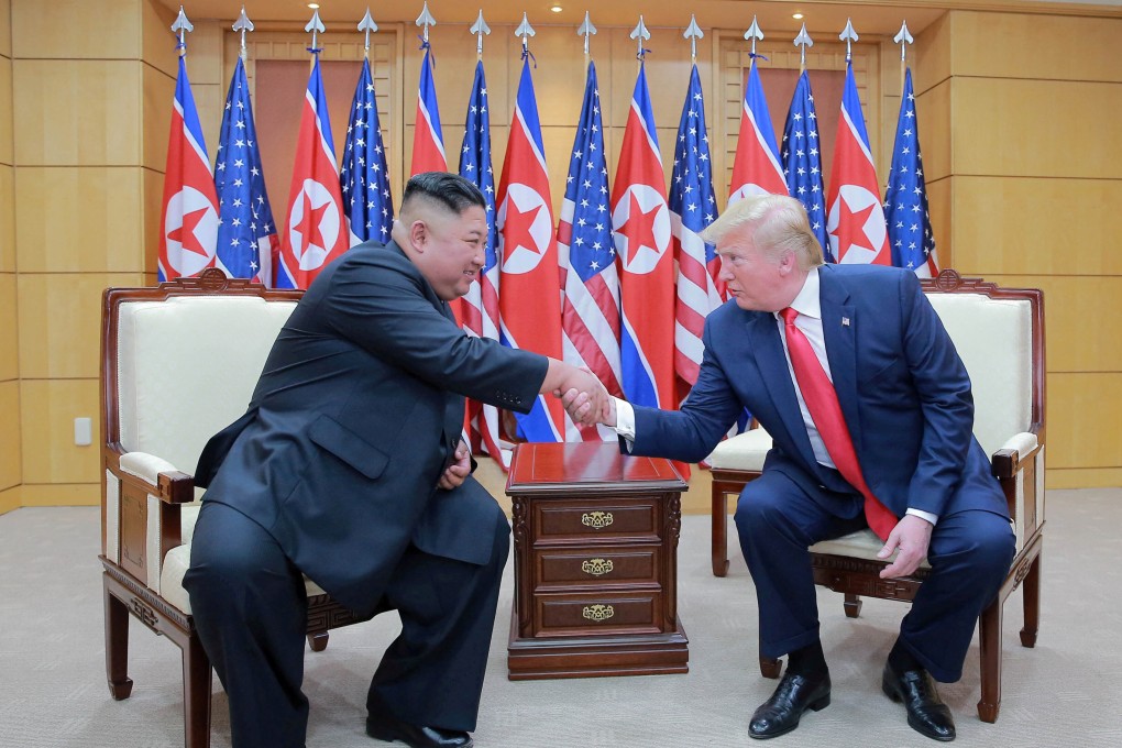 US President Donald Trump with North Korean leader Kim Jong-un at the demilitarised zone separating the two Koreas in Panmunjom on June 30, 2019. Photo: Reuters