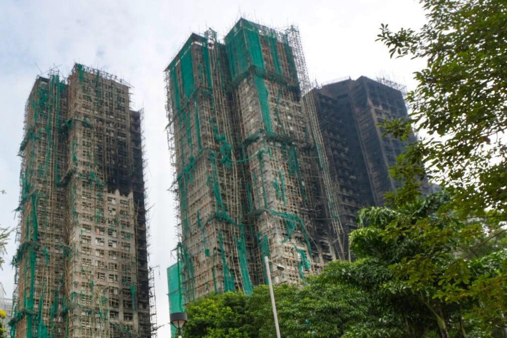 A man has been arrested for posing as victim of the deadly fire in Tai Po to claim relief aid. Photo: Karma Lo