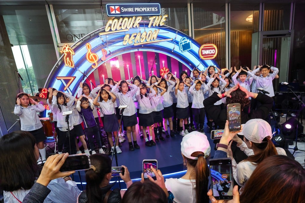 Children perform at the tree lighting ceremony for the White Christmas Street Fair. Photo: Dickson Lee
