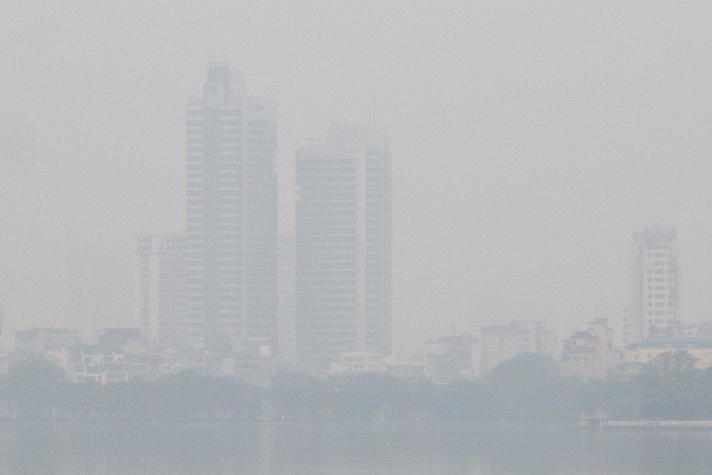 Buildings across the West Lake are barely visible due to heavy air pollution in Hanoi, Vietnam last week. Photo: Xinhua