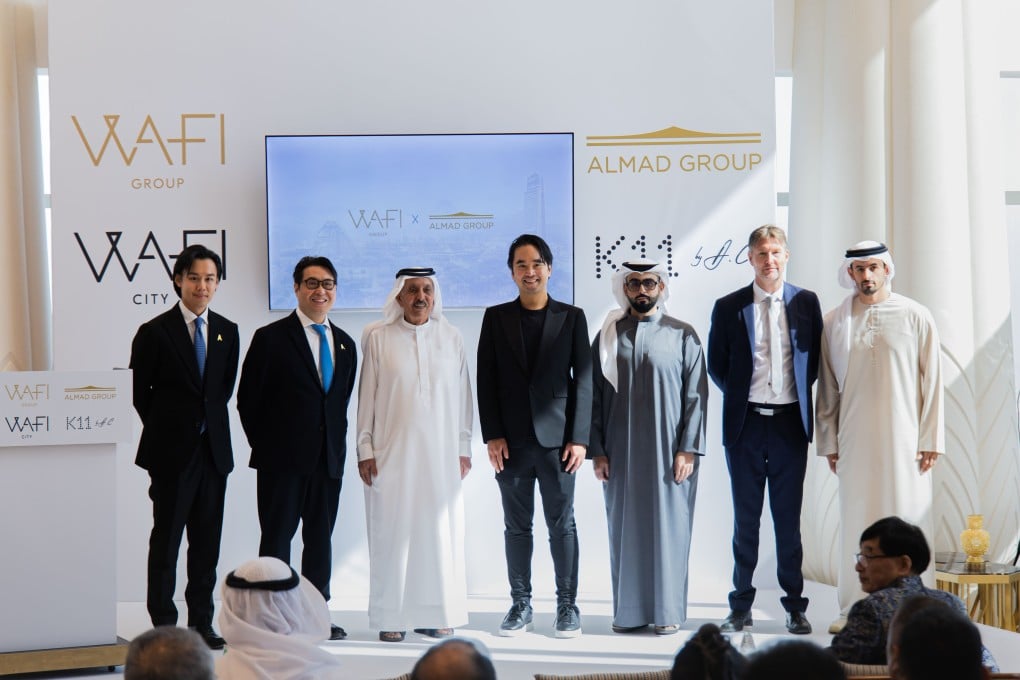 Sheikh Mana bin Khalifa Al Maktoum (third from left) and Adrian Cheng (centre), pictured at a signing ceremony on Wednesday in Dubai. Photo: Handout
