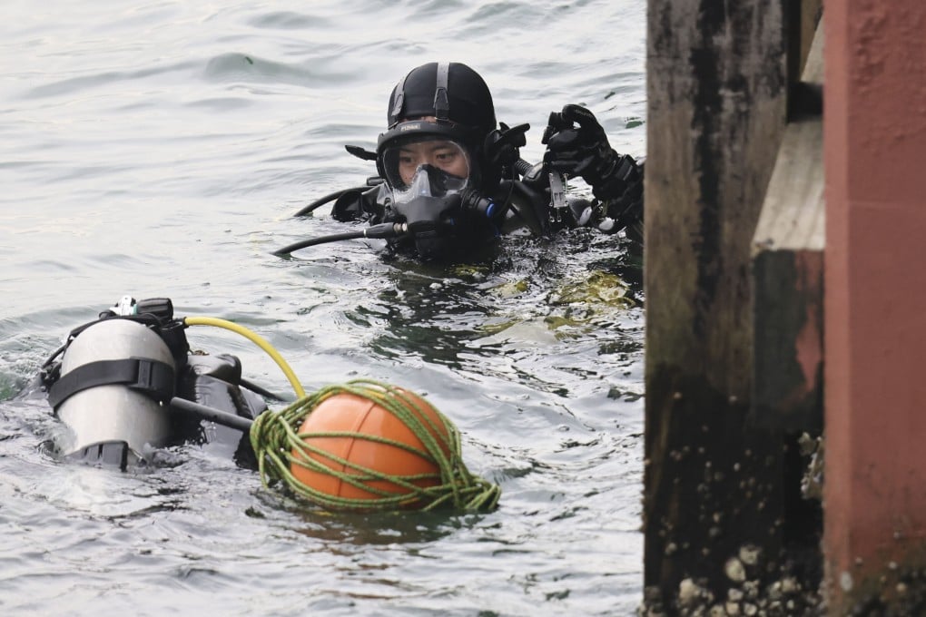 The Special Duties Unit is an elite squad of the Hong Kong Police Force and carries out high-risk operations. This diver is pictured during a police operation in June. Photo: Jelly Tse
