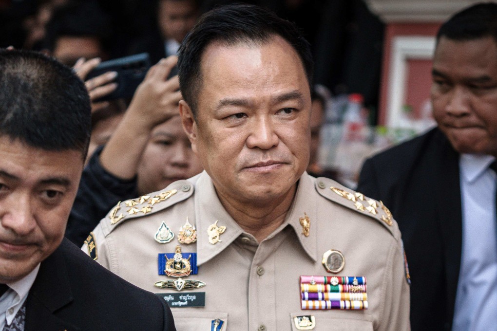 Thailand’s Prime Minister Anutin Charnvirakul (centre) walks after chairing a National Security Council (NSC) meeting at the Government House in Bangkok on November 11, 2025. Photo: AFP