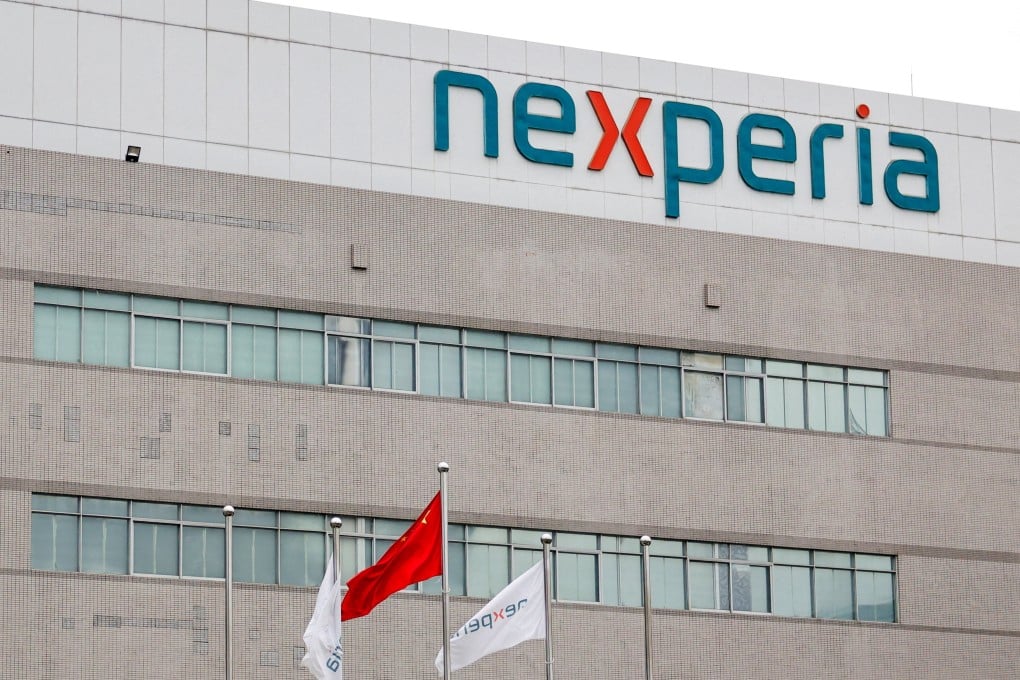Flags fly next to a logo of Nexperia at the facade of its factory in Dongguan, Guangdong province, on November 7. Photo: Reuters