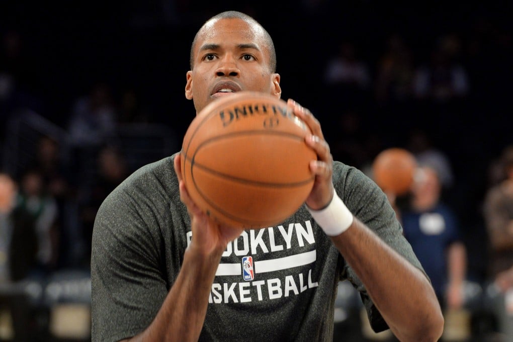 Jason Collins, then a player with the Brooklyn Nets, warmed up before a match against the Los Angeles Lakers at Staples Centre in Los Angeles, California in 2014. Photo: AFP