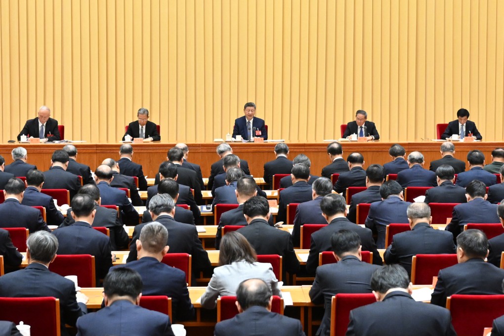 President Xi Jinping (centre) speaks at the annual central economic work conference in Beijing on Thursday. Photo: Xinhua