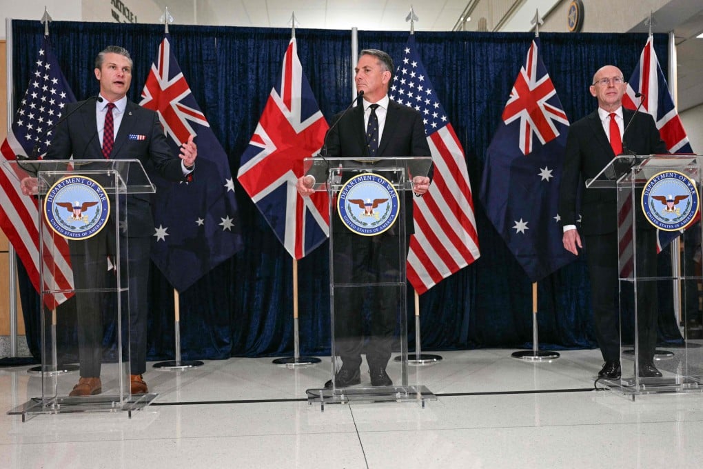 (Left to right) US Secretary of Defence Pete Hegseth,  Australian Deputy Prime Minister and Defence Minister Richard Marles and UK Defence Secretary John Healey speaking to the media following their meeting to discuss Aukus in Washington on Wednesday. Photo: AFP