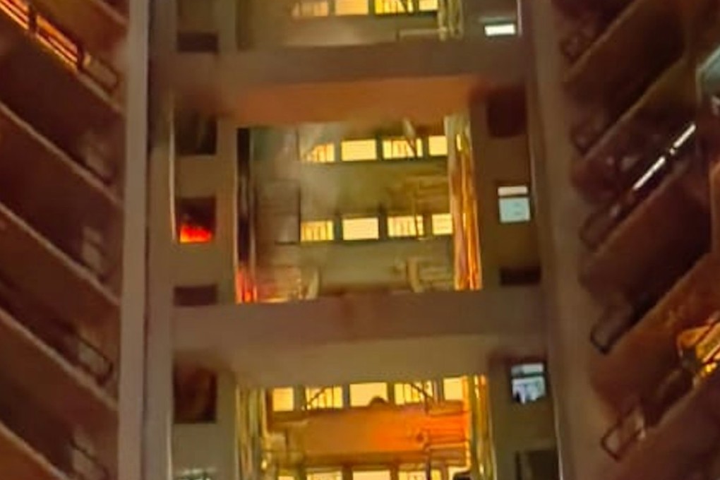 Flames are seen at the flat in Tin Shui Wai. The occupant sustained burns on 20 per cent of his body. Photo: Handout
