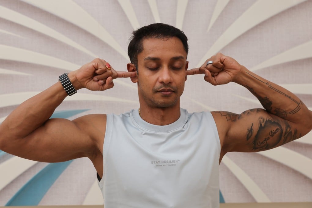 Yoga instructor Samrat Dasgupta demonstrates Bhramari pranayama – or humming bee breath – at the Prana Yoga studio in Hong Kong. Photo: Edmond So