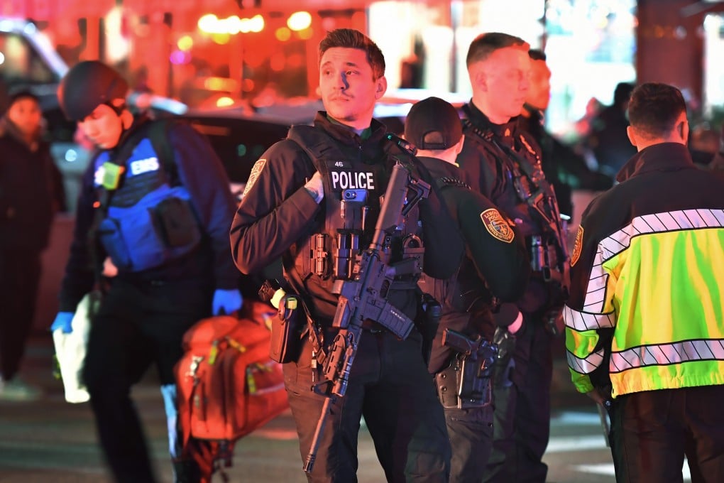 Police officials gather near Brown University in Providence, Rhode Island on Saturday. Photo: AP