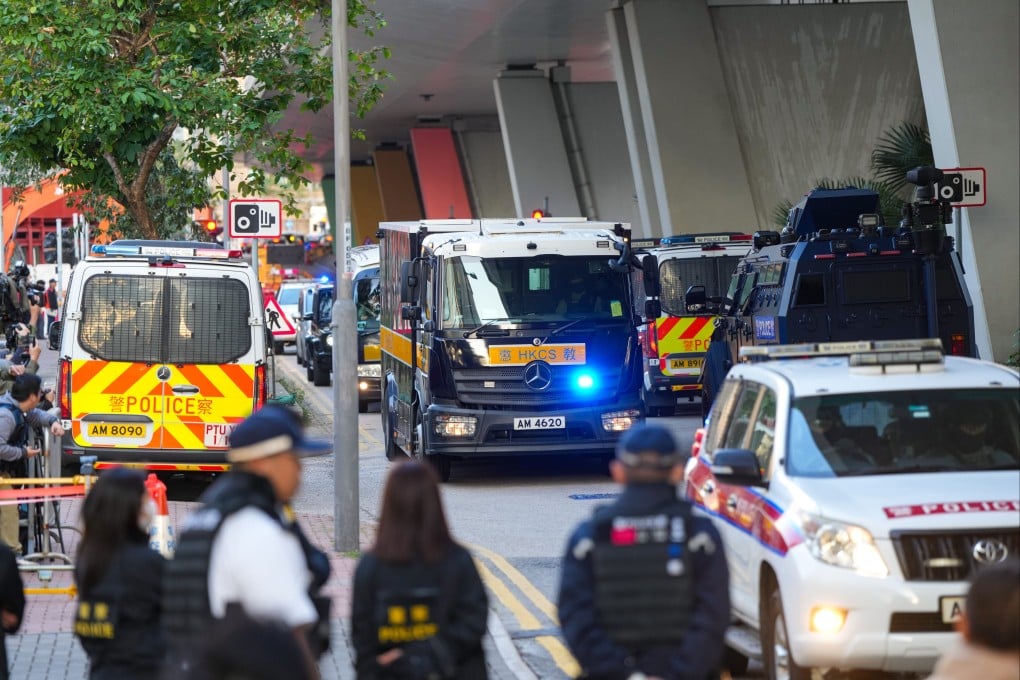 A Correctional Services Department vehicle carrying Jimmy Lai is escorted by police to West Kowloon Magistrates’ Court on December 15. Photo: Sam Tsang