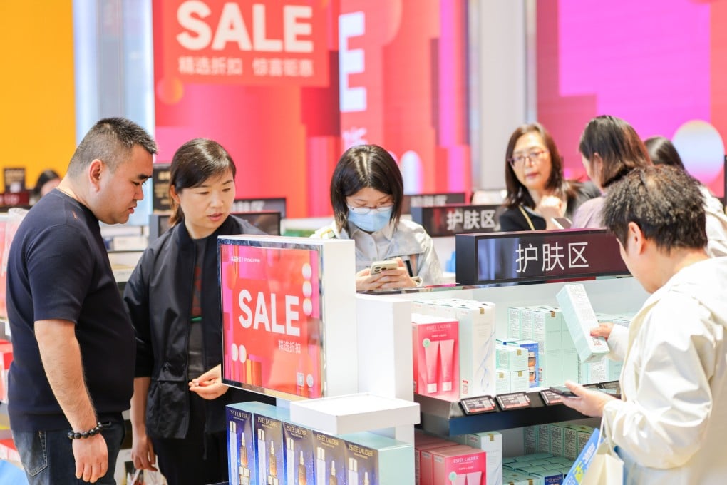 Customers shop for skincare products at the Global Premium Duty Free Plaza on December 2, in Haikou, Hainan province. Photo: China News Service via Getty Images
