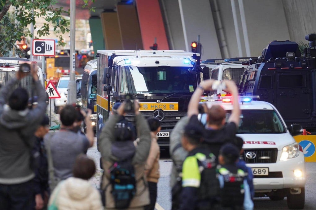 A Correctional Services Department vehicle carrying Jimmy Lai is escorted by police to the court. Photo: Karma Lo