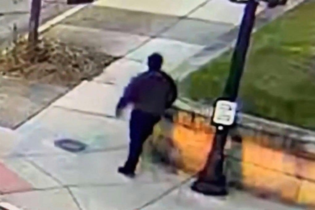 Authorities on Saturday released a short video clip of a person of interest dressed in black. Photo: Providence Police Department via AFP