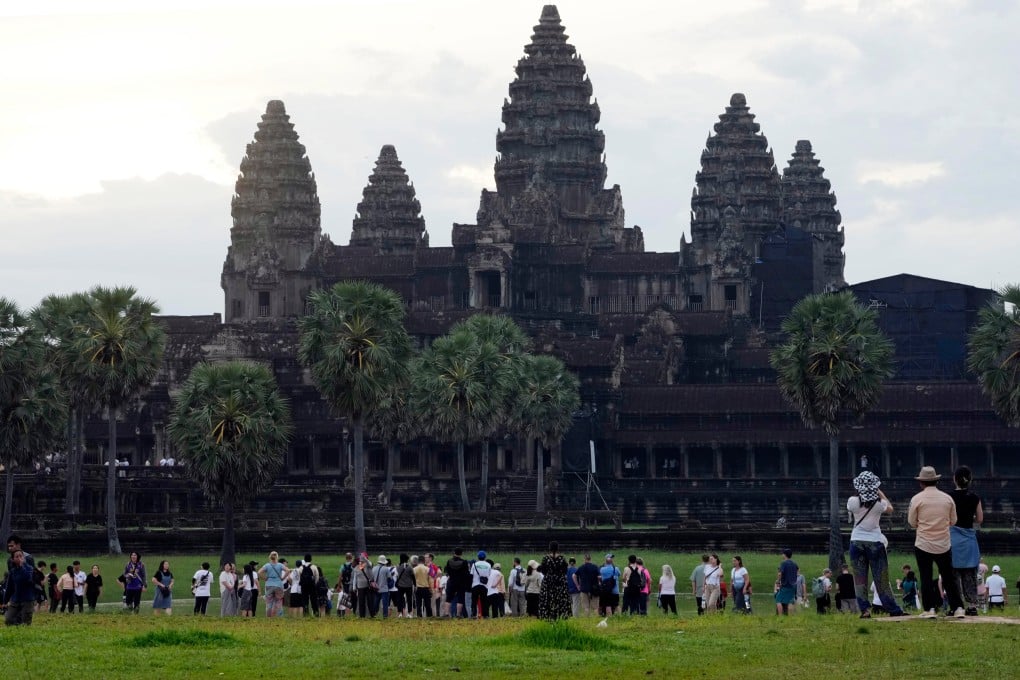 Tourists at the Angkor Wat temple complex in Siem Reap province, Cambodia, last year. Photo: AP