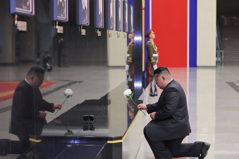 North Korean leader Kim Jong-un pays his respects in front of portraits of soldiers killed during an overseas deployment in Russia’s Kursk region, during a ceremony in Pyongyang on Friday. Photo: AFP