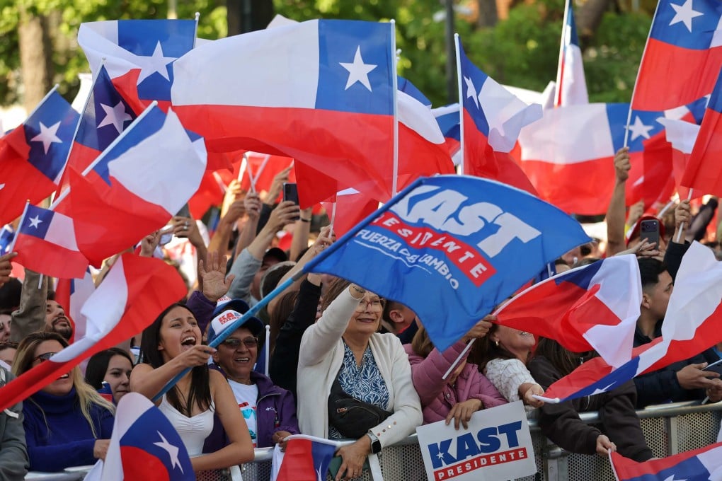 Supporters of Chile’s winning presidential candidate Jose Antonio Kast react as the first election results are announced on Sunday. Photo: AFP