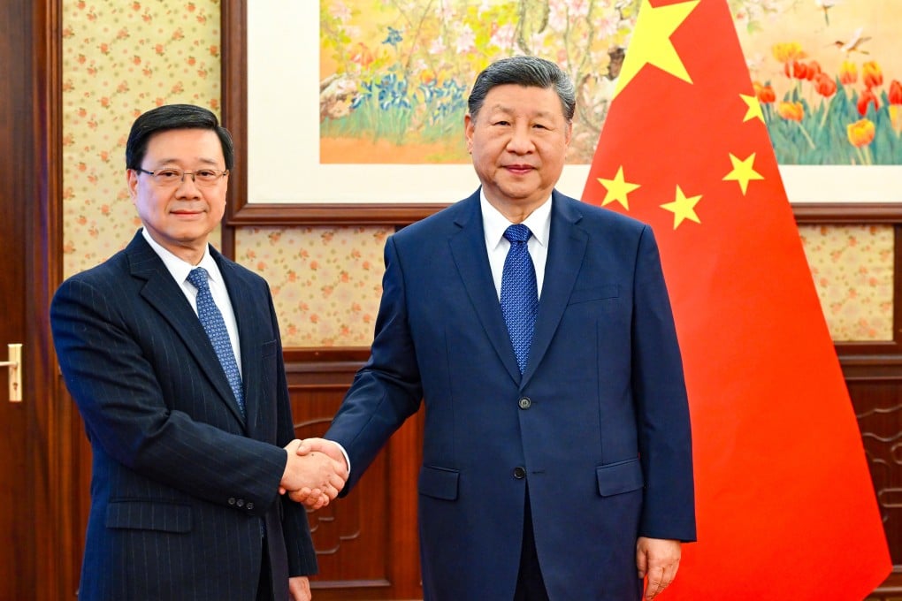 President Xi Jinping (right) meets Chief Executive John Lee in Beijing on Tuesday. Photo: Xinhua