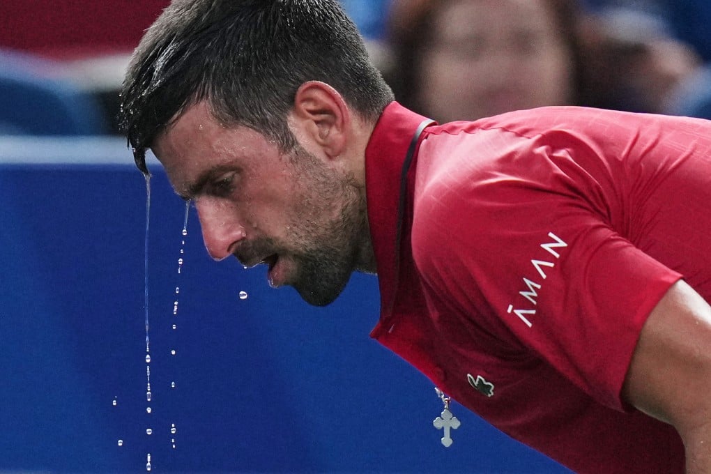 Novak Djokovic cools himself during a match at the Shanghai Masters in October. Photo: AP