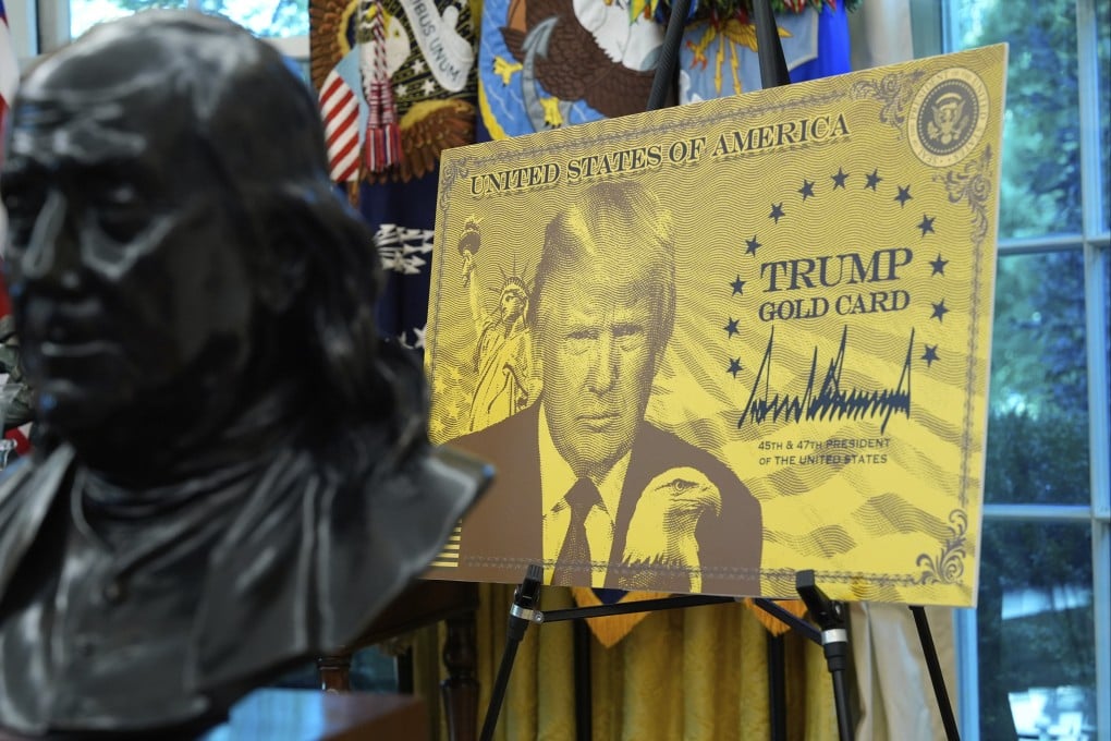 A poster showing the ‘gold card’ is pictured as US President Donald Trump speaks in the Oval Office of the White House on September 19. Photo: AP