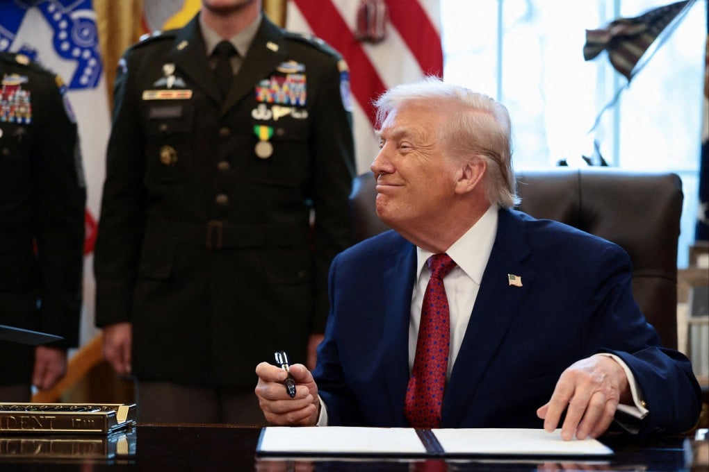 US President Donald Trump prepares to sign an executive order classifying fentanyl as “weapon of mass destruction” in the Oval Office on Monday. Photo: Reuters