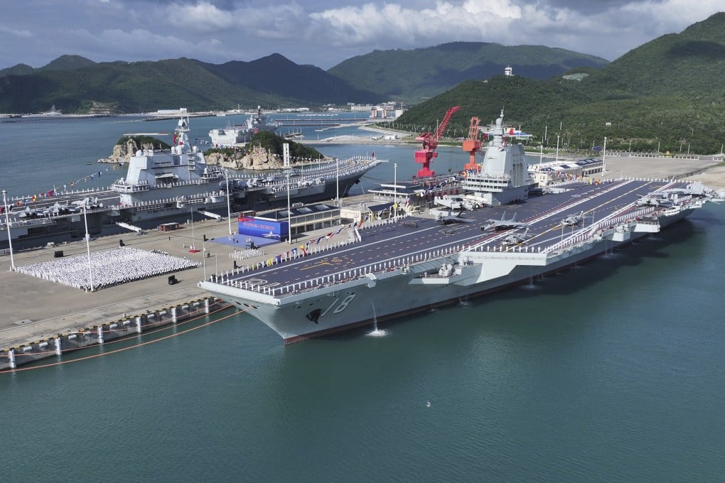 The Fujian, China’s newest aircraft carrier, is commissioned on November 5 in Sanya, Hainan province. Photo: Xinhua