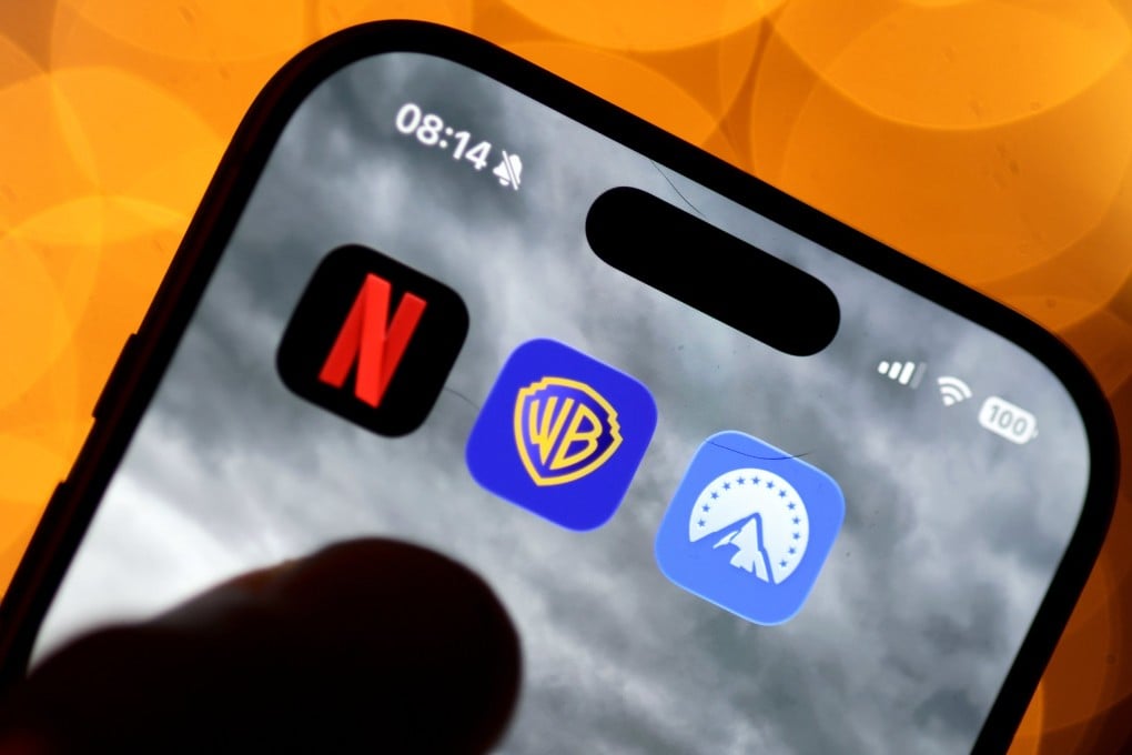 The app logos of Netflix, Warner Bros and Paramount are seen on a smartphone display. Photo: EPA