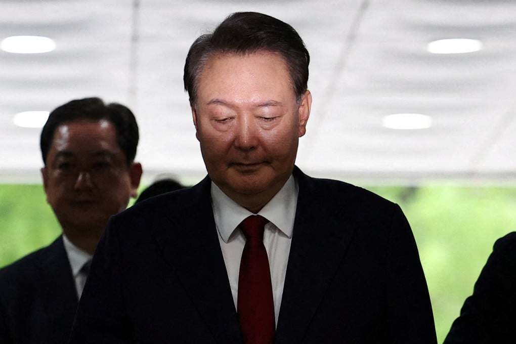 Former South Korean president Yoon Suk-yeol arrives at a court in Seoul, South Korea, for questioning in July. Photo: Reuters