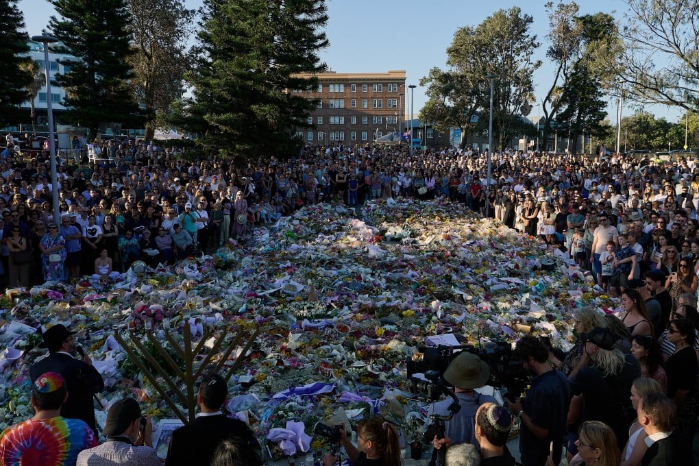 Mourners pay tribute to the Bondi Beach shooting victims in Sydney on Wednesday. Photo: EPA