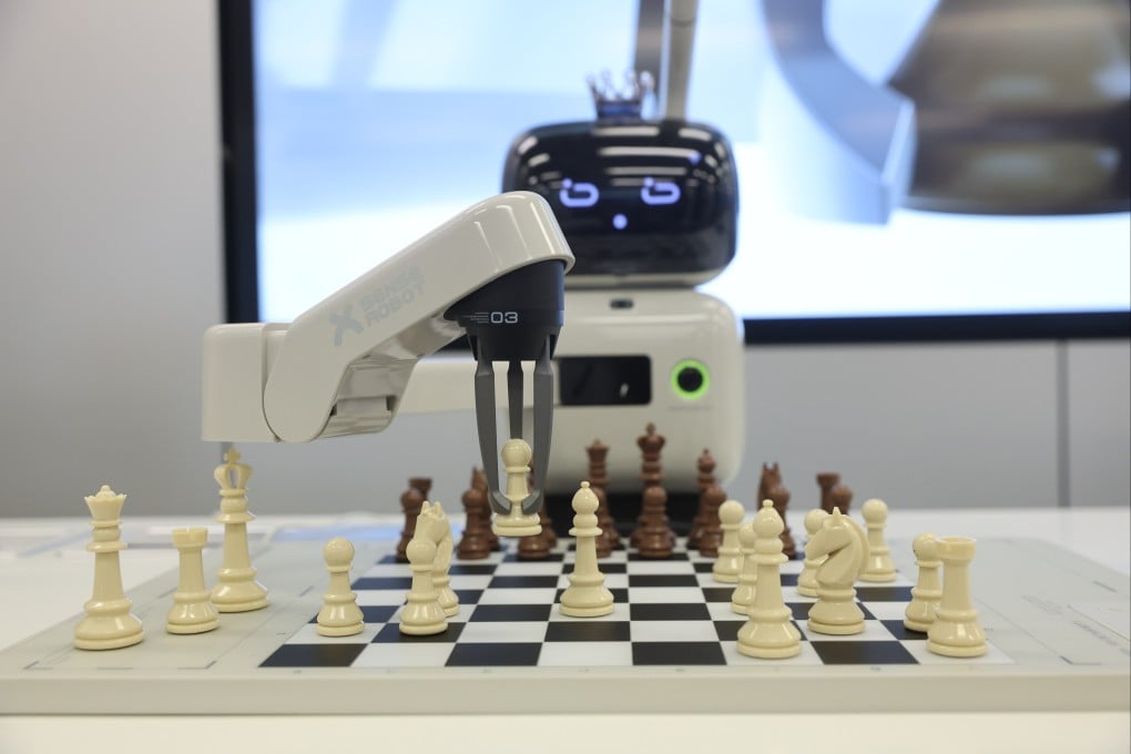 SenseTime’s AI-powered interactive machine, SenseRobot, plays a round of chess at the Hong Kong Science Park. Photo: Edmond So