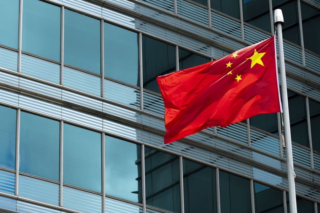 A national flag flies outside the Commissioner’s Office of China’s Foreign Ministry in Hong Kong. Photo: Warton Li