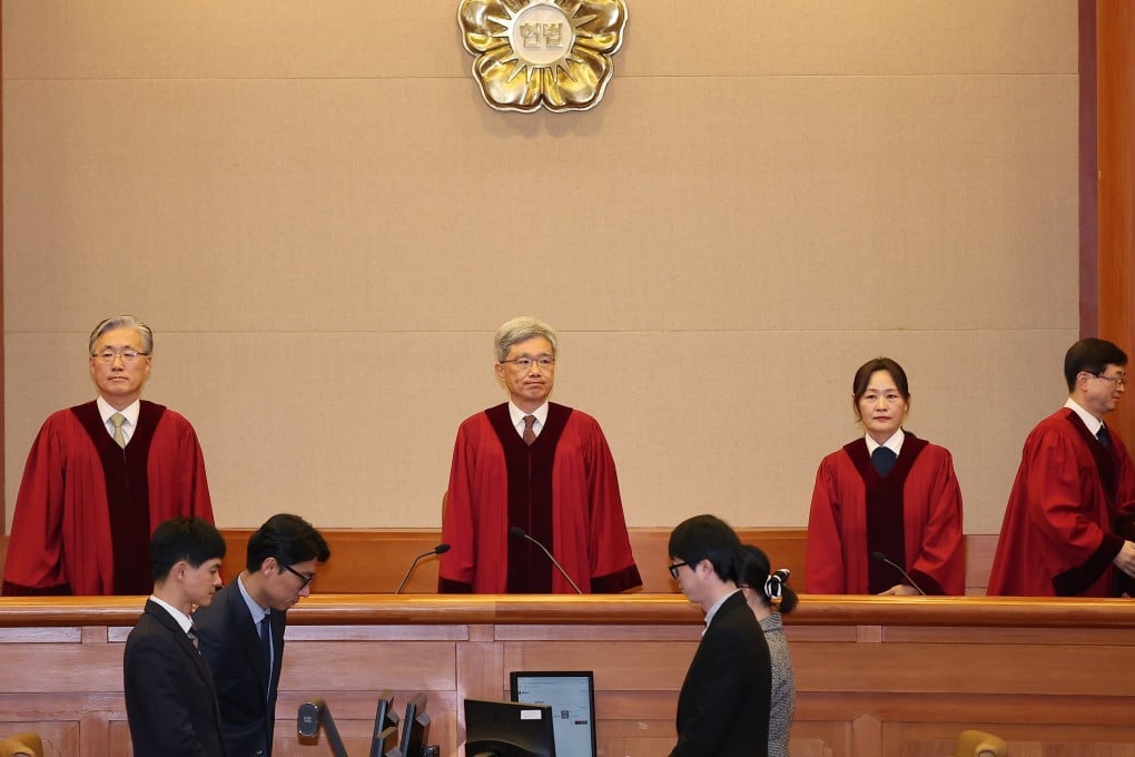 South Korea’s Constitutional Court justices attend a hearing in Seoul on Thursday to deliver a verdict on the impeachment of former police chief Cho Ji-ho over his role in former president Yoon Suk-yeol’s failed martial law bid. Photo: EPA