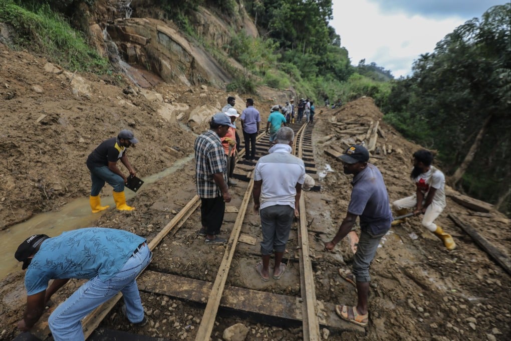 Workers try to restore the damaged railway track after landslides in Badulla, Sri Lanka, on December 13. Many parts of the island were inundated in the wake of Cyclone Ditwah. Photo: EPA