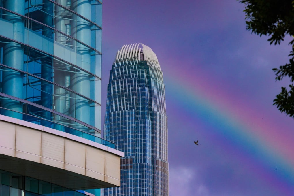 A rainbow is seen behind the International Finance Centre (IFC) in Central, with the Hong Kong Convention and Exhibition Centre in the foreground, July 1, 2025. Photo: Nora Tam